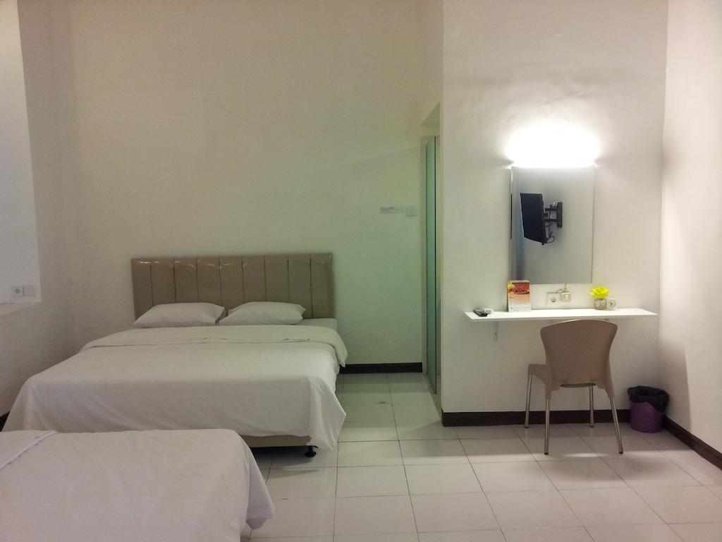 Loxy Inn Surabaia Quarto foto